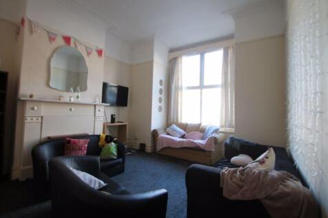 A cozy living room featuring comfortable seatin...
