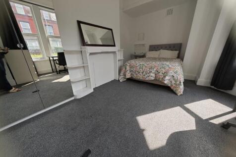 Bright and inviting double bedroom featuring a ...