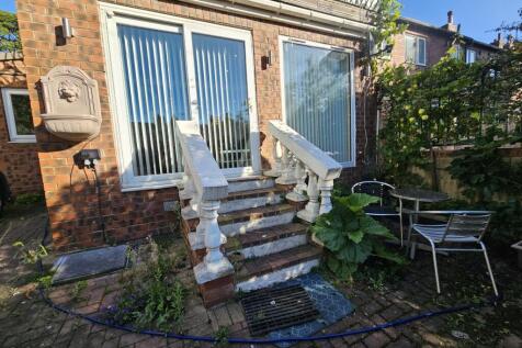 A charming front view of a residential property...