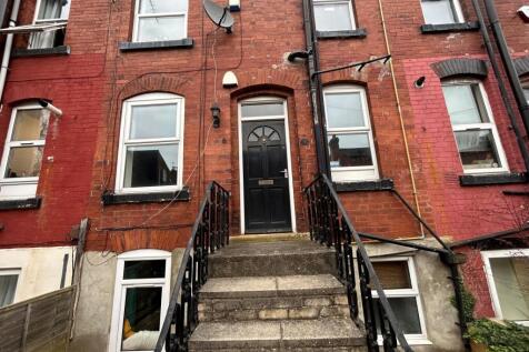 The image showcases the inviting front exterior...