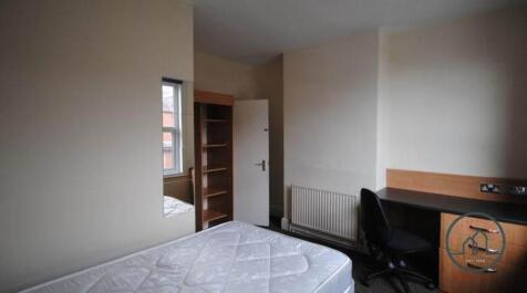 A small bathroom with a visible WC, featuring b...