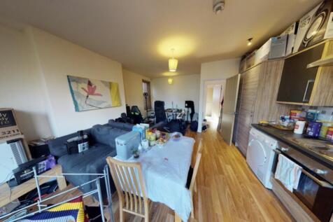 A cozy living room with a comfortable seating a...