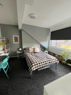 Bright and inviting master bedroom featuring a ...