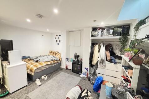 A cozy and functional living space filled with ...