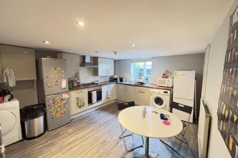 Modern and well-organized kitchen with efficien...