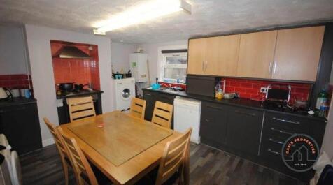 A bright and functional kitchen with a good amo...