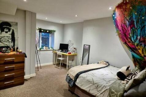 A bright and inviting living room featuring mod...