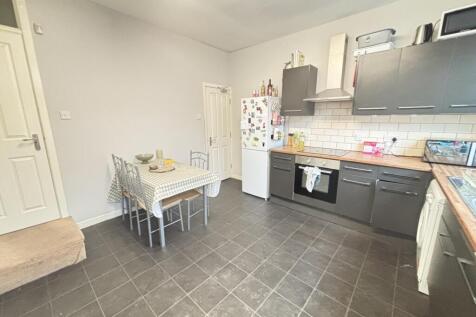 Bright and modern kitchen with ample space for ...