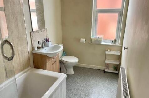 A clean and well-maintained bathroom featuring ...