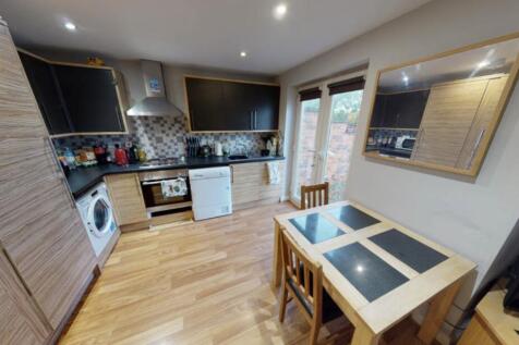 A well-maintained kitchen area featuring modern...