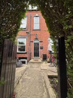 A charming view of the front of a traditional b...