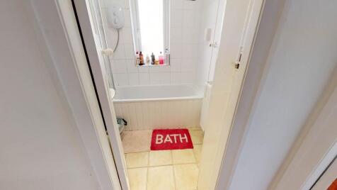 A clean, well-maintained bathroom with a spacio...