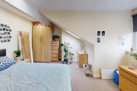 Bright and welcoming living room with plenty of...