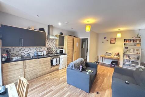 A bright, contemporary living room with comfort...