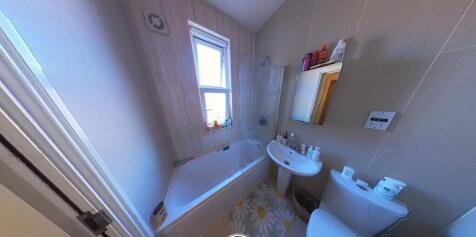 Bright and clean bathroom with modern fixtures,...