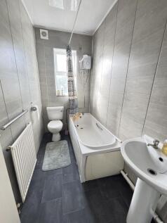 A clean and well-maintained bathroom featuring ...