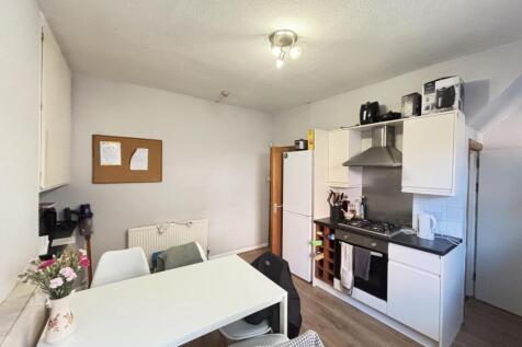 Bright and functional kitchen space with modern...