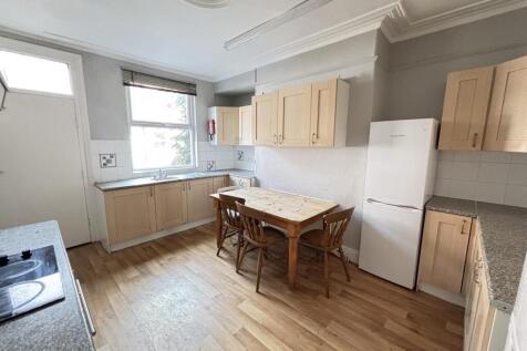 Bright and spacious kitchen with ample natural ...