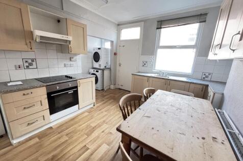 Bright and well-maintained kitchen with ample n...