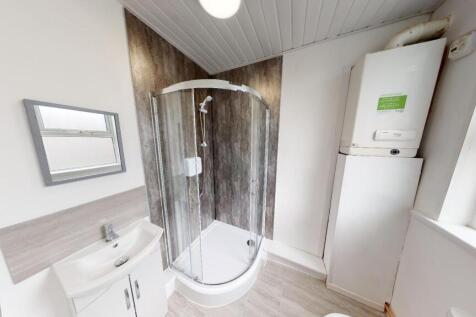 A modern, well-maintained bathroom featuring a ...
