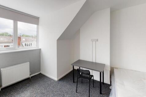 A small, functional bathroom with a minimalisti...