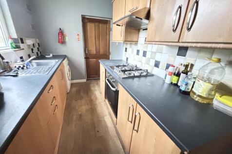 A well-maintained kitchen with ample countertop...