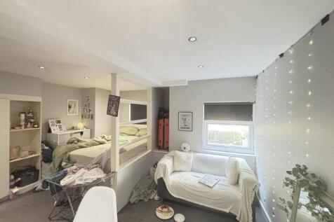 Bright and welcoming living area featuring a co...