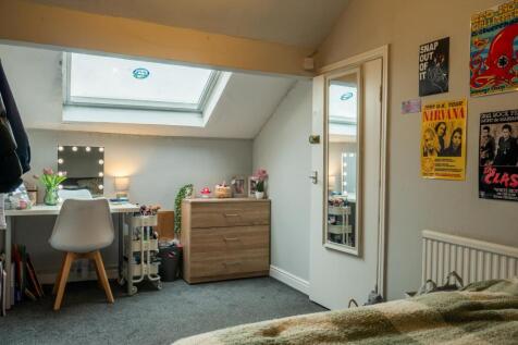 Bright and inviting living room with natural li...