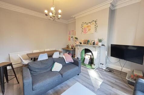 A bright and welcoming living room with contemp...