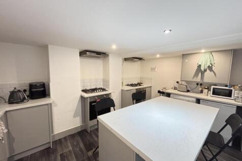 Modern and clean kitchen with ample workspace a...