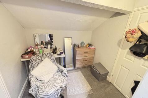 A functional bathroom with basic amenities show...