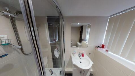 A clean and well-maintained bathroom featuring ...