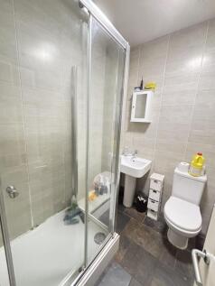 A clean and well-maintained bathroom featuring ...