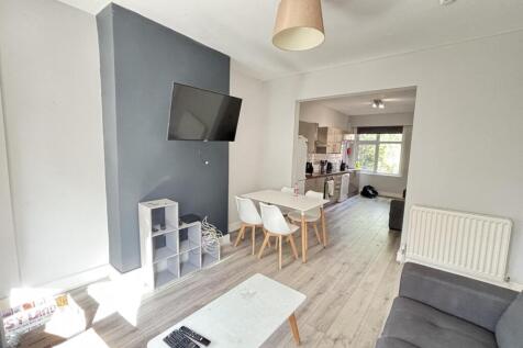 Bright and inviting living room with modern dec...