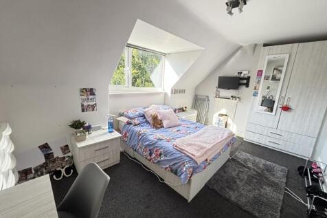 Bright and inviting double bedroom featuring a ...