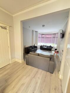 Bright and spacious living room with modern fur...