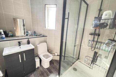 A modern, well-maintained bathroom featuring a ...