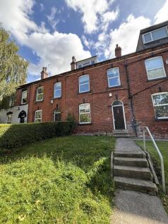 The exterior view of a charming brick property ...