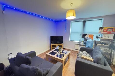 A modern and cozy living room with comfortable ...