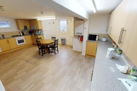 A bright and spacious living area with modern d...