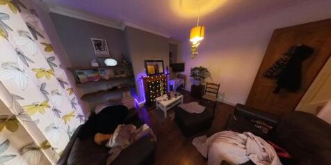 A welcoming contemporary living room featuring ...