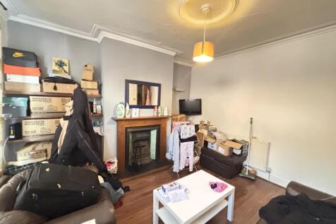 A cozy and inviting living room featuring comfo...