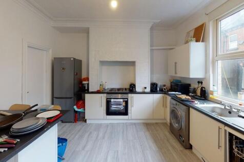 Bright and well-lit kitchen featuring modern ap...