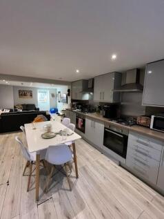 Modern and well-maintained kitchen area with am...