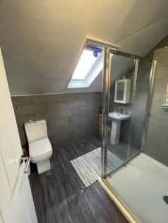 A clean and well-maintained bathroom featuring ...