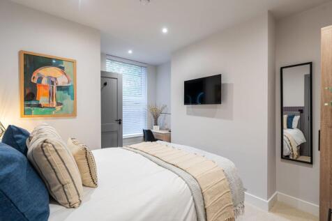 Contemporary and inviting living room featuring...