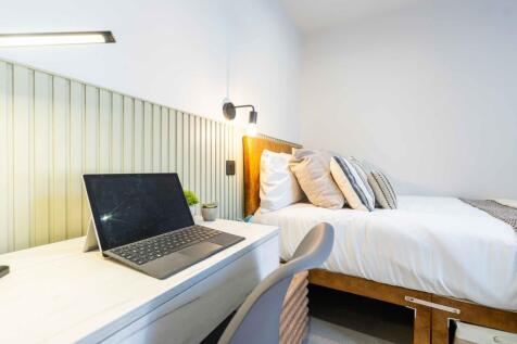 Bright and inviting master bedroom featuring a ...