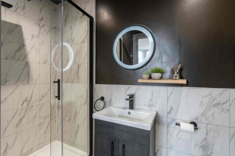 Modern bathroom with a sleek, minimalist design...
