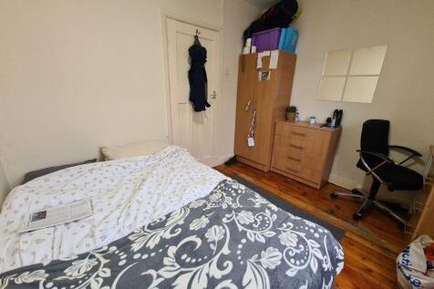 A spacious and well-maintained master bedroom f...