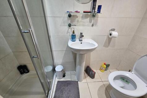 A clean and well-maintained bathroom featuring ...